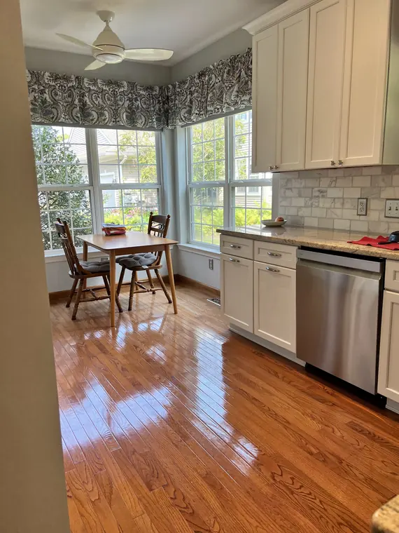 Bright kitchen and dining area after professional cleaning