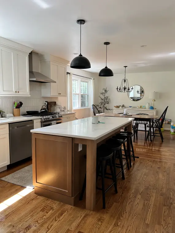 Open kitchen and dining space after detailed cleaning
