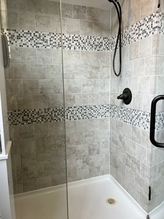 Detailed tile shower after professional deep cleaning