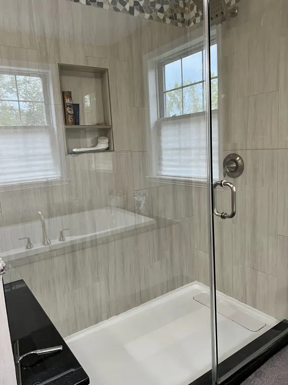 Glass shower enclosure cleaned and polished